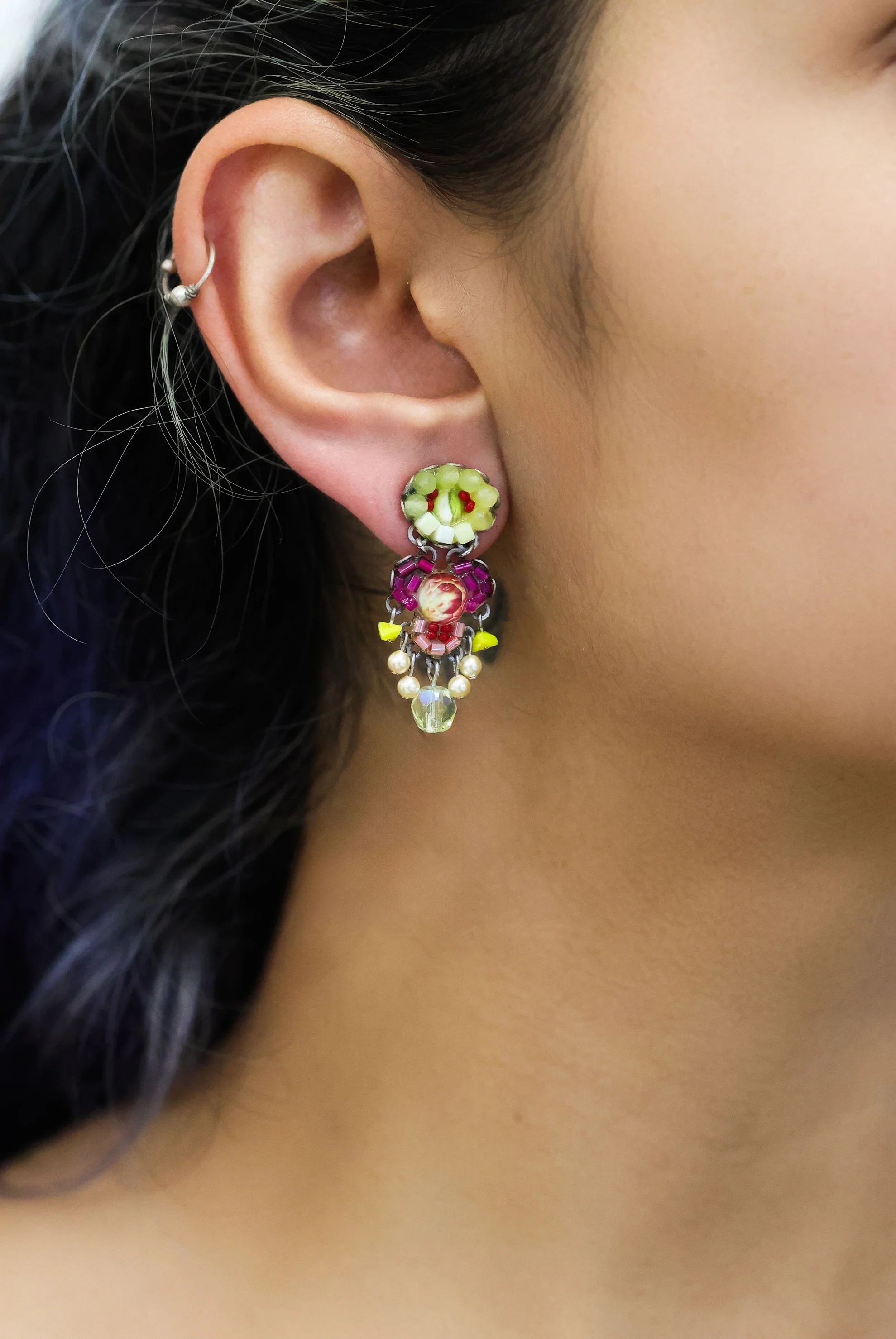 Plated Sterling Silver Earrings  predominantly featuring Many tiny beads with mainly red pruple and earthy tones with dangling beads held together by silver chain | on model
