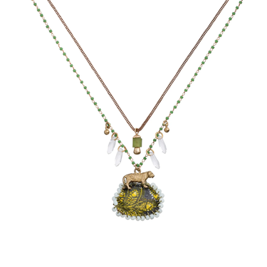Plated Sterling Silver Necklace predominantly featuring a texttile design primarily black and yellow, with a tiger above it. Connected to it is  2  thin chains with small white gems hanging and a small green gemstone in the middle of the chains 
