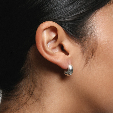  Sterling silver dome hoops with Sterling silver posts  | on model