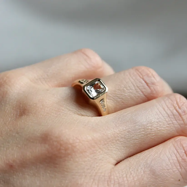 Stardust Halo' 1ct RBC Lab Diamond Bezel Set Ring in 14k Yellow Gold with - 0.90ct Radiant Cut White Sapphire Bezel Set w. Side Diamonds | on model