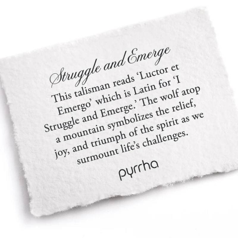 A Pyrrha note that describes the Struggle and Emerge talisman. It reads, "This talisman reads 'Luctor et Emergo' which is Latin for 'I Struggle and Emerge.' The wolf atop a mountain symbolizes the relief, joy, and triumph of the spirit as we surmount life's challenges."