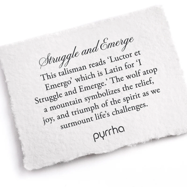 A Pyrrha note that describes the Struggle and Emerge talisman. It reads, "This talisman reads 'Luctor et Emergo' which is Latin for 'I Struggle and Emerge.' The wolf atop a mountain symbolizes the relief, joy, and triumph of the spirit as we surmount life's challenges."