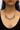 Plated Sterling Silver Earrings  predominantly featuring Many tiny beads with mainly red pruple and earthy tones with dangling beads held together by silver chain | on model