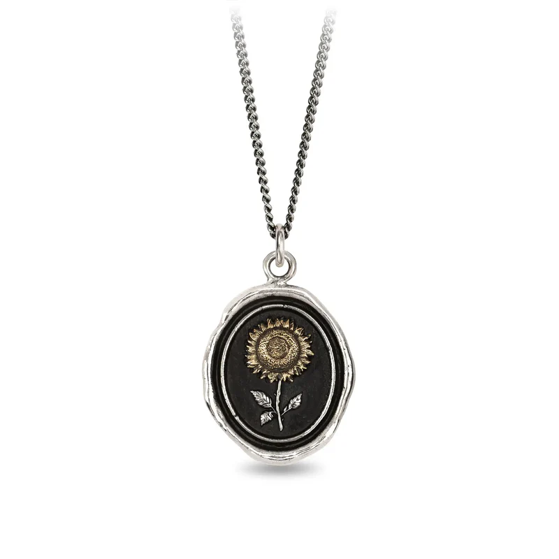 Sterling Silver talisman necklace depicting a sunflower With the flower being made from gold
