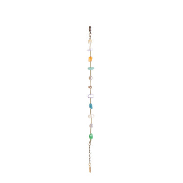 This handmade Surya Bracelet features a fun and beachy multicolour design with warm brass accents. featuring Chrysoprase, Carnelian, Apatite, Amethyst, Freshwater Pearl, and gold-plated brass nuggets.