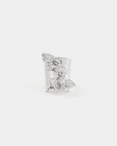 Silver statement ring made entirely of pewter, adorned with flower-shaped pendants