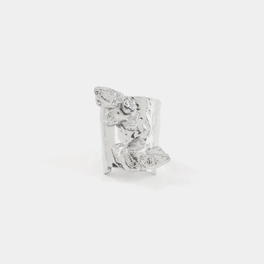 Silver statement ring made entirely of pewter, adorned with flower-shaped pendants