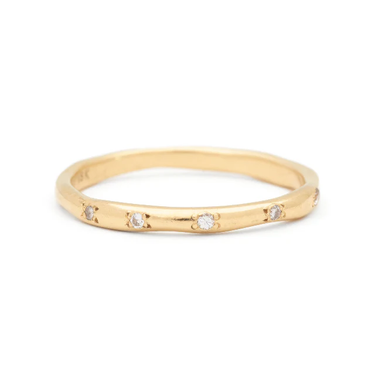 14k Fairmined Gold Ring wtih 10 round brilliant cut diamonds playfully scattered around ring