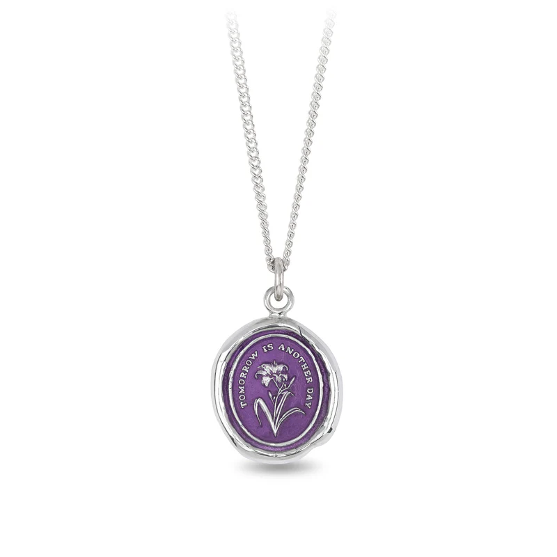 Sterling Silver Necklace with a violet background under a talisman depicting a single daylilly flower, with the words "Tomorrow is another day" written above it