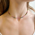 Tourmaline necklace featuring carefully-selected 4mm Watermelon Tourmaline beads, securely placed along a 14k gold clasp | on model