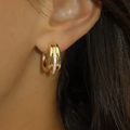 14k yellow gold plated sterling silver stud hopps with a triplette pave, and a midle ring studded with pave diamonds | on model