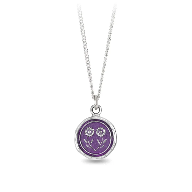 Sterling Silver talisman necklace with a bright violet background depicting two daisies connected at their stems.