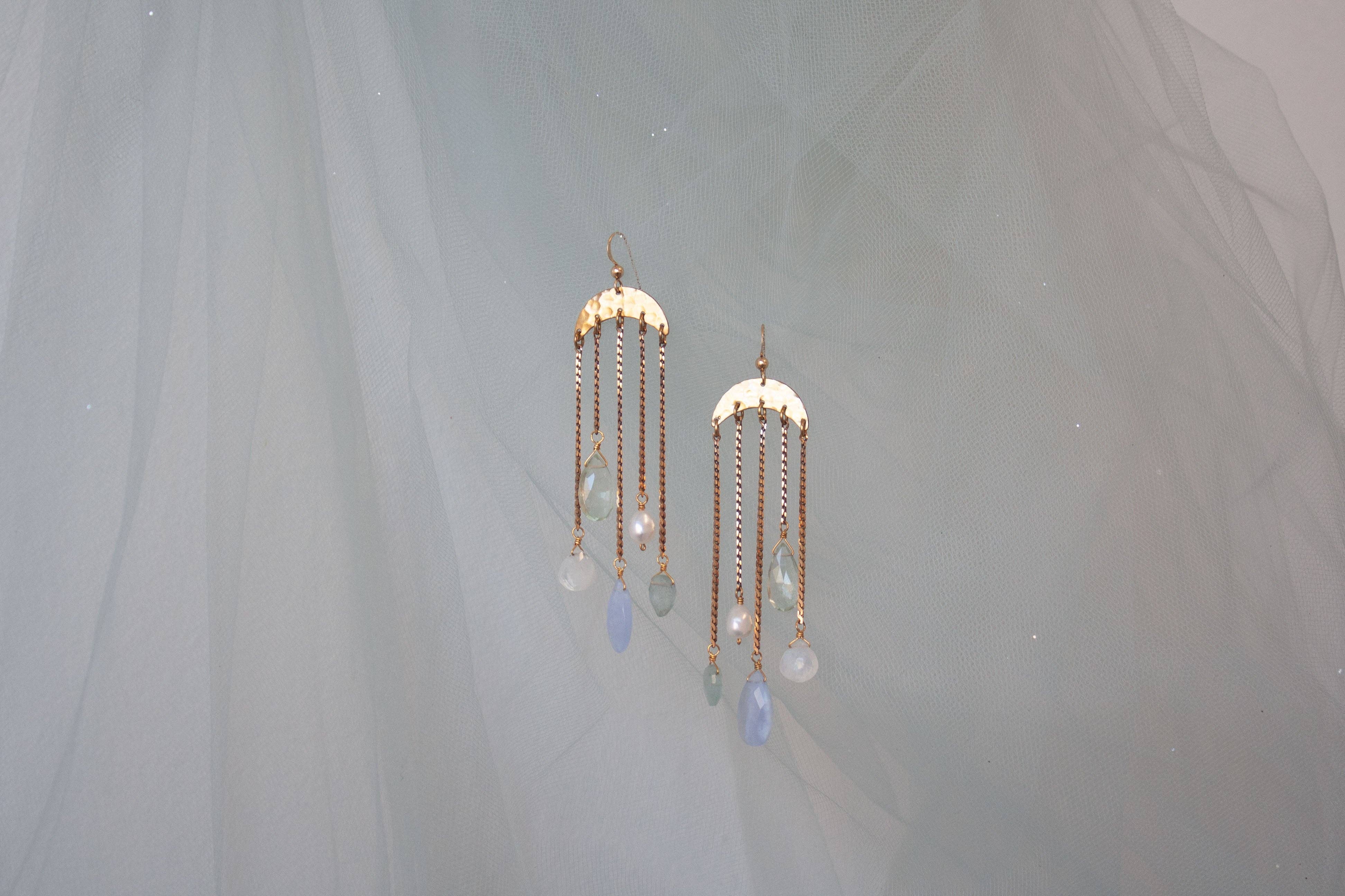 Umbrella Earrings featuring hammered brass "umbrellas" with gemstone and Freshwater Pearl drops descending from vintage brass chains below.