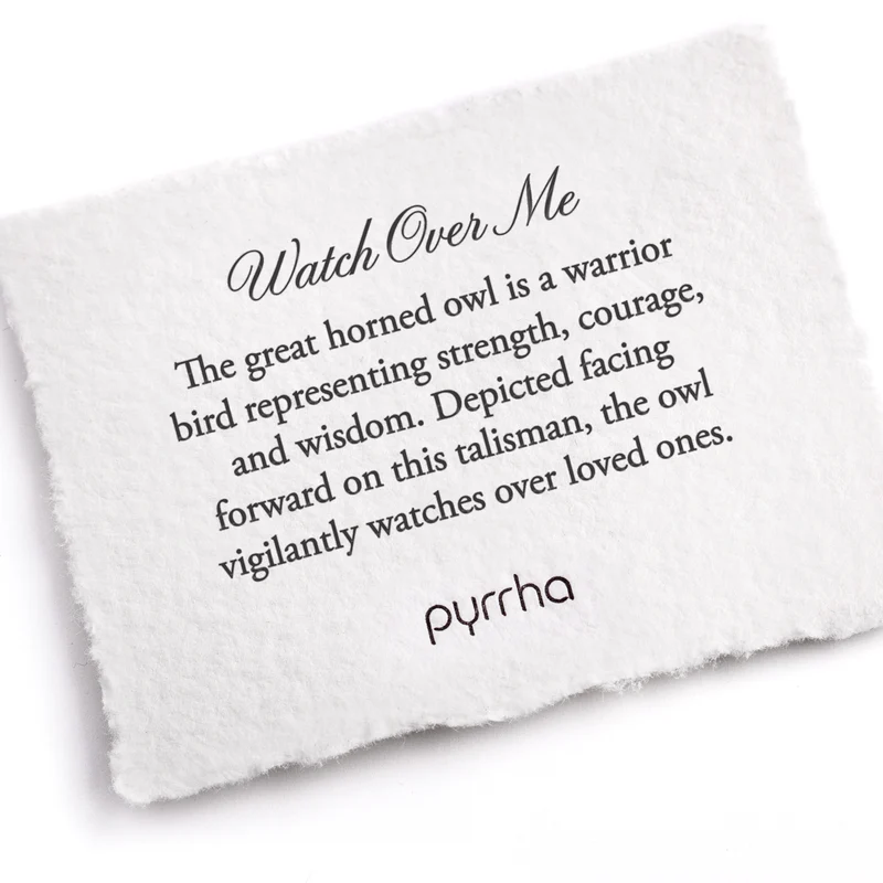 A Pyrrha note describing the Watch over me talisman. It reads, "The great horned owl is a warrior bird representing strength, courage, and wisdom. Depicted facing forward on this talisman, the owl vigilantly watches over loved ones."