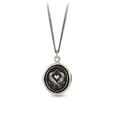 Sterling silver Necklace featuring a talisman depicting 2 crows crossing eachother with a heart between them and their beaks connected by a ring 