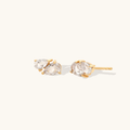 14k Yellow gold plated sterling silver studs  with a pear cut white topaz gemstone 