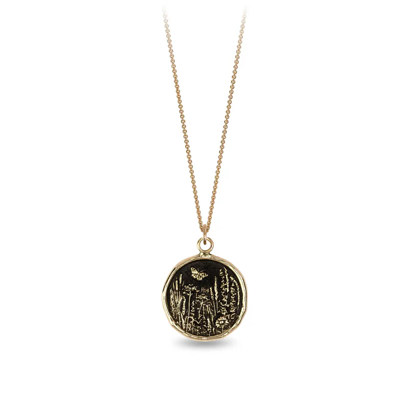14k Yellow gold talisman Necklace depicting a Butterfly flying over a field of varying flora and plants