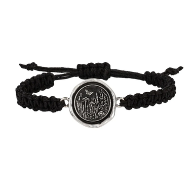 Black Braided Bracelet with a Sterling Silver talisman depicting a butterfly flying above a field of various flora and grass