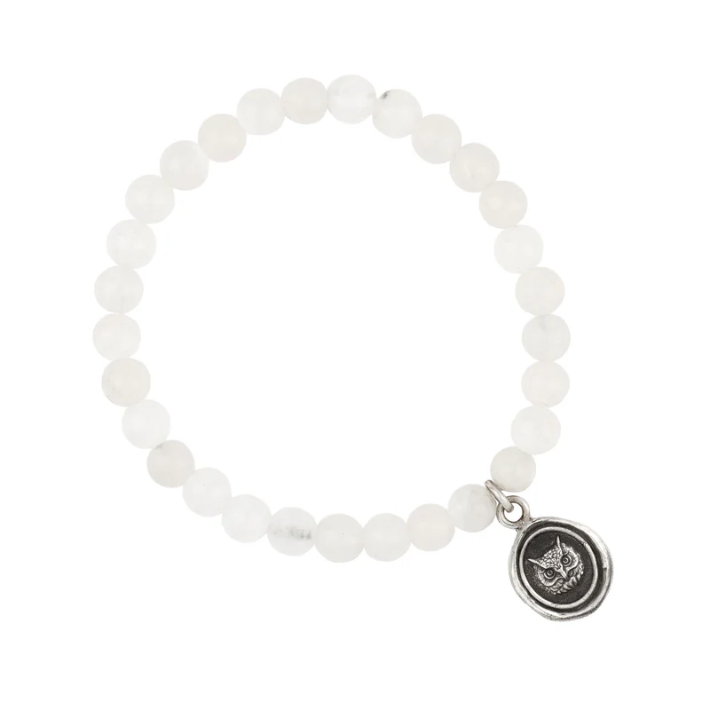 Bracelet made from White Jade beads, with Sterling Silver Talisman depicting an Owl