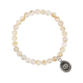 Bracelet made from Rutilated Quartz beads, with Sterling Silver Talisman depicting an Owl