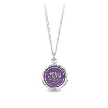 Sterling Silver necklace with a violet background under a talisman depicting a heart wrapped in ribbons that read out, "you live in my heart"