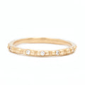 Dotty Ring with Nine Diamonds - 14k Fairmined Yellow Gold Band with 3D dots all around band, featuring nine diamonds