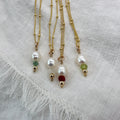 Pearl and assorted birthstone pendant on 18 inch dot chain