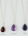 Silver Gemstone Solo Necklace | Magpie Jewellery | Black Onyx | Garnet | Amethyst, Faceted | Iolite, Faceted | Listed Left-to-Right | Labelled