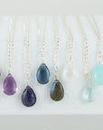 Silver Gemstone Solo Necklace | Magpie Jewellery | Black Onyx | Garnet | Amethyst, Faceted | Iolite, Faceted | Dark Blue Quartz | Labradorite | Moonstone | Aquamarine, Faceted | Aqua Chalcedony | Listed Left-to-Right