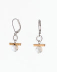 Pictured: drop earrings on white background, composed of a surgical steel leverback closure connected by a jump loop to a horizontal bronze-coloured bar set atop a pale agate stone. The agates are spherical and polished, and appeared to be drilled through, as the silver-coloured disc at the end of the bead pin is slightly visible at the bottom. Faint greyish speckling is visible in both stones.