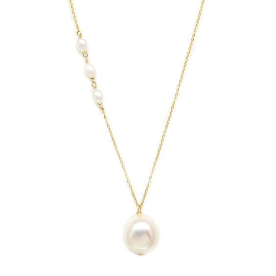 A large baroque pearl pendant anchors a 14-karat gold chain with a trio of baby keshi pearl on one side. 