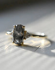 Oval Brilliant Cut Salt & Pepper Diamond Engagement Ring with White Trillion Accents - Magpie Jewellery