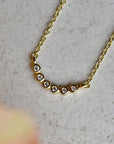 Tiny Bezel 7-Stone Crescent Necklace - Magpie Jewellery