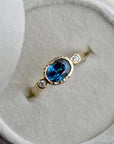 Emerging from the Sea Gold, Diamond & Blue Zircon Ring - Magpie Jewellery