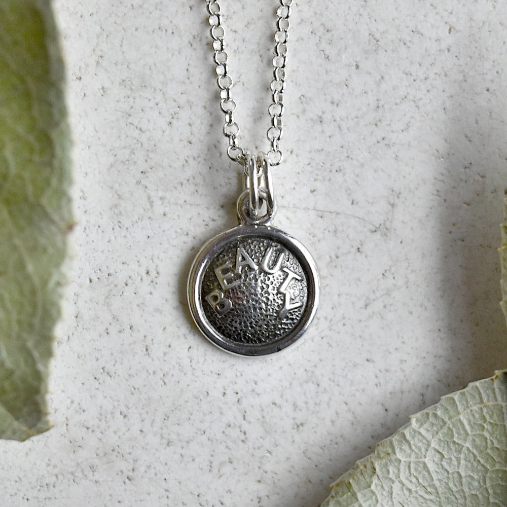 &#39;Beauty&#39; Tiny Die Struck Silver Necklace - Magpie Jewellery