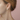 A pair of double pearl 14k Gold earrings featuring four lustrous pearls | on model