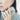 A pair of double pearl 14k Gold earrings featuring four lustrous pearls | on model