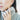 A pair of double pearl 14k Gold earrings featuring four lustrous pearls | on model