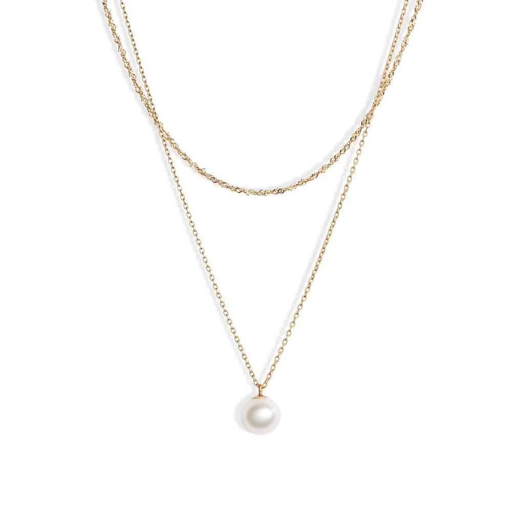 Two 14-karat gold chains layered together with a sweet lustrous white pearl pendant. 