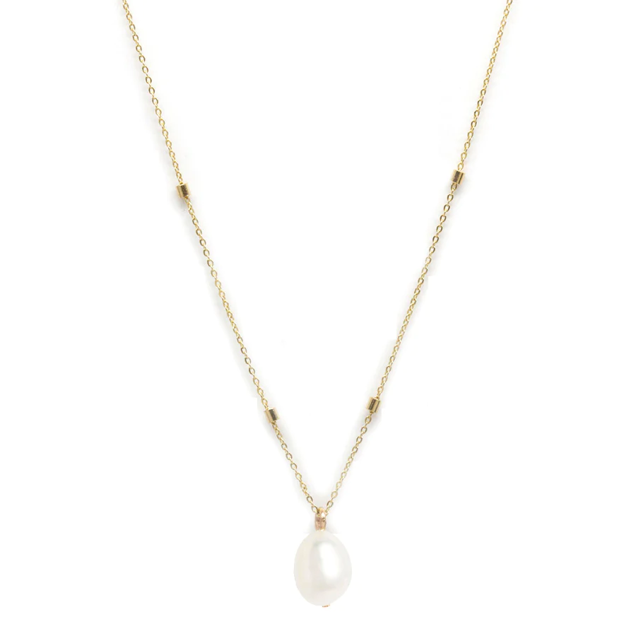 An oval shaped pearl pendant on a dainty 14-karat gold chain with little gold bead details.