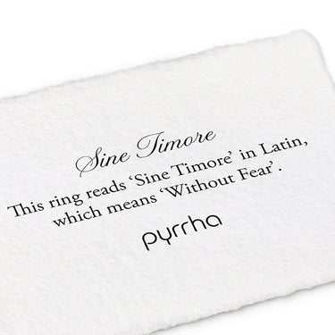 A Pyrrha note describing the Sine Timore ring. it reads, "this ring reads "sine Timore" in Latin, which means 'without Fear'