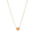 A vibrant heart shaped gemstone pendant on a dainty 14-karat gold chain. 