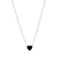 A vibrant heart shaped gemstone pendant on a dainty 14-karat gold chain. 