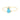 14-karat gold ring showcasing a pear-shaped turquoise with a light-catching diamond at the tip