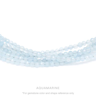 Strung 'Wrap' aquamarine gemstone bead necklace with attached / integrated charm clasp.
Anne Sportun tag charm, and beaded charm included.