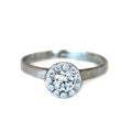14kt white gold ring with a round brilliant diamond with a halo of diamonds and a textured finish