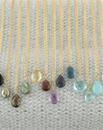 Gold Fill Gemstone Solo Necklace | Magpie Jewellery | Yellow Gold | Black Onyx | Pyrite | Smoky Quartz, Faceted | Labradorite | Citrine, Faceted | Garnet | Amethyst, Faceted | Iolite, Faceted | Dark Blue Quartz | Teal Quartz, Faceted | Aquamarine, Faceted | Aqua Chalcedony | Moonstone | Stones Listed Left-to-Right