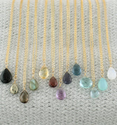 Gold Fill Gemstone Solo Necklace | Magpie Jewellery | Yellow Gold | Black Onyx | Pyrite | Smoky Quartz, Faceted | Labradorite | Citrine, Faceted | Garnet | Amethyst, Faceted | Iolite, Faceted | Dark Blue Quartz | Teal Quartz, Faceted | Aquamarine, Faceted | Aqua Chalcedony | Moonstone | Stones Listed Left-to-Right